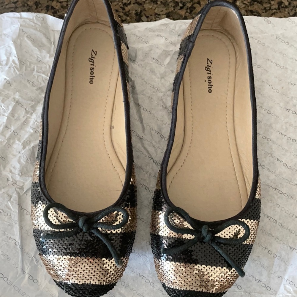 Gold and black ballerina flats